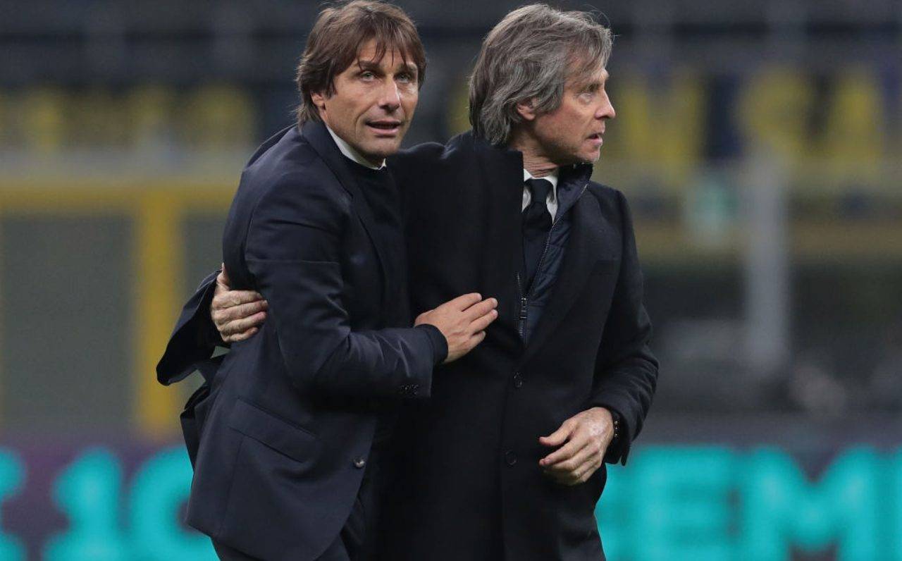 Conte e Oriali si abbracciano