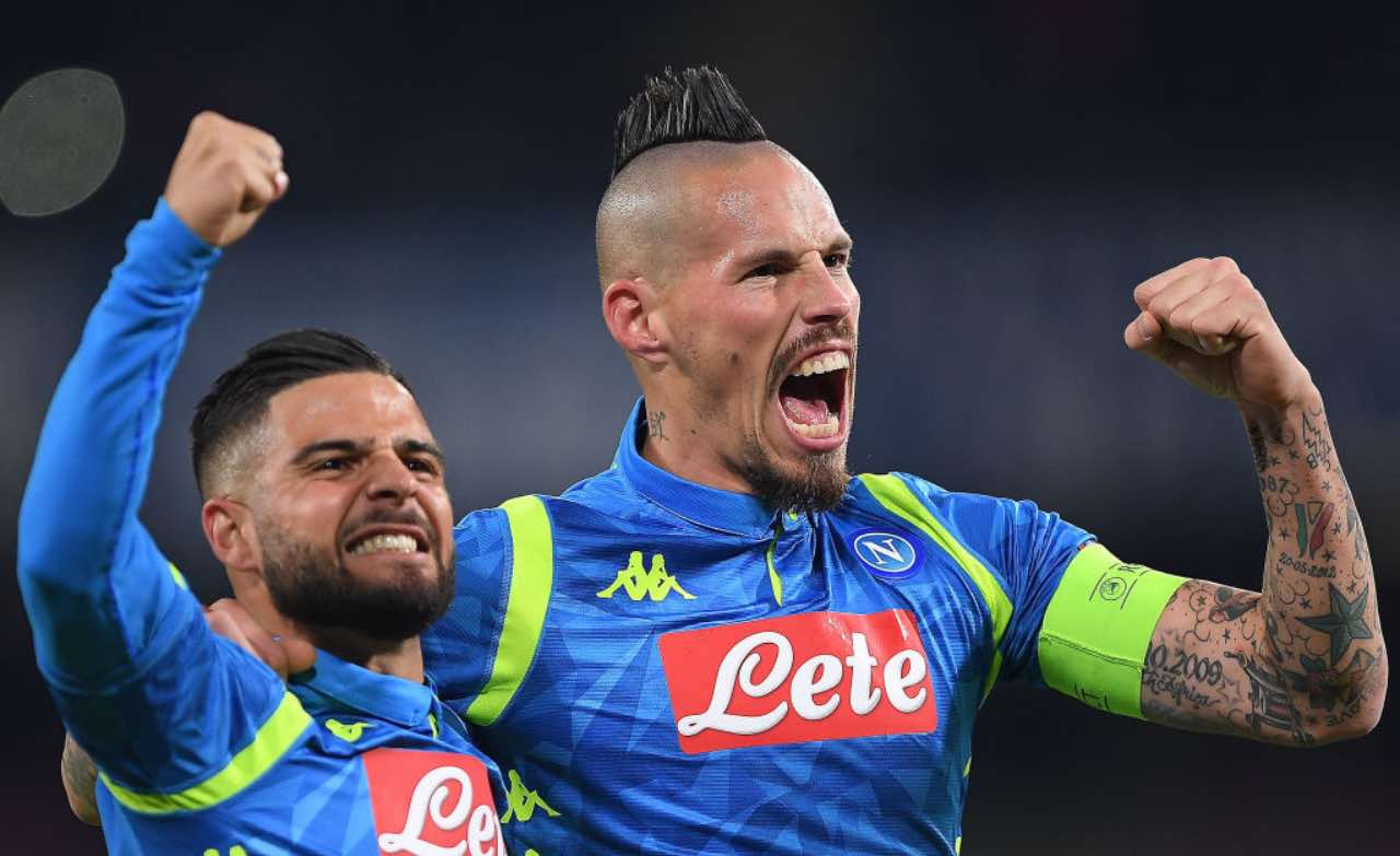 Hamsik e Insine con la camiseta del Napoli