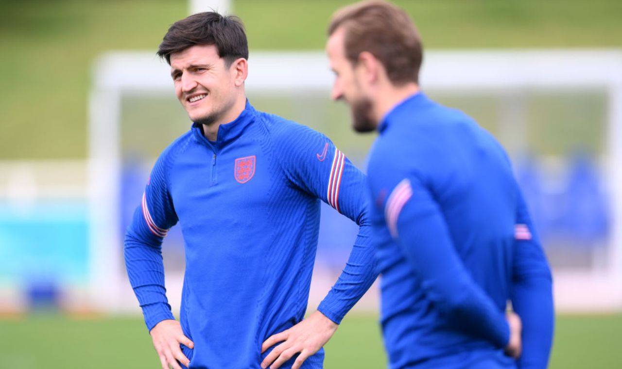 Maguire e Kane sorridono