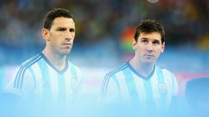 Maxi Rodríguez y Messi