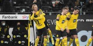 Brandt festeggiato dai compagni dopo il vantaggio del Borussia Dortmund