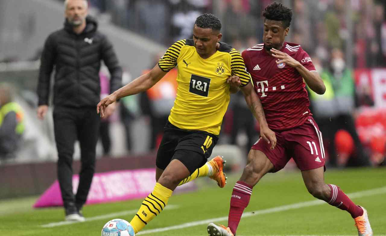 Manuel Akanji con Coman