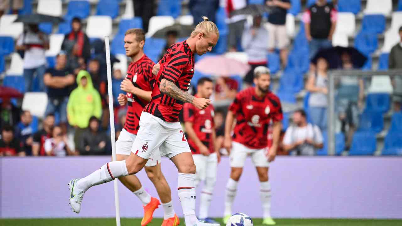 Milan giocatori in riscaldamento 