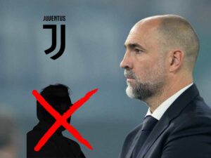 Igor Tudor guarda avanti a sé e il logo della Juventus