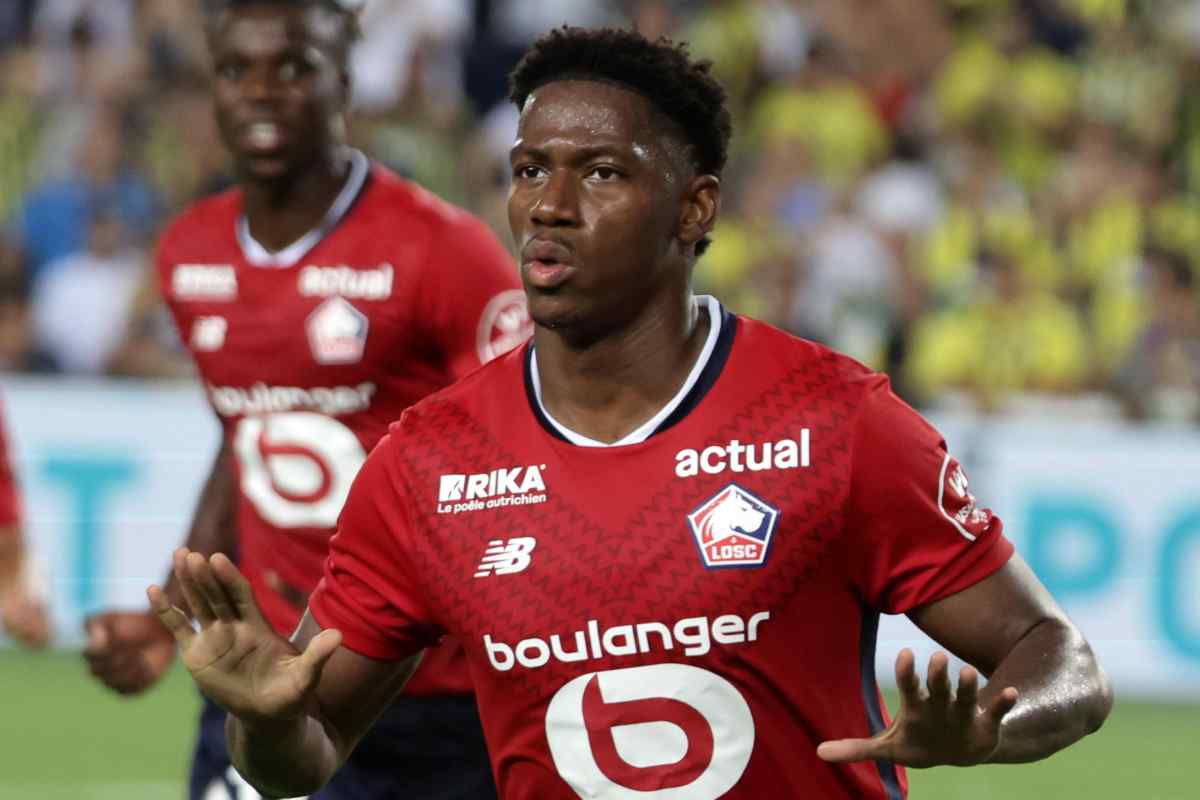 Jonathan David esulta con la maglia dell'Inter
