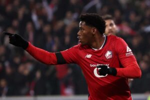 Jonathan David esulta dopo il gol